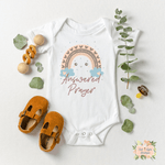 Answered Prayer onesie: cute christian baby announcement ideas. ANSWERED PRAYER PREGNANCY ANNOUNCEMENT BODYSUIT - Salt and Light Boutique
