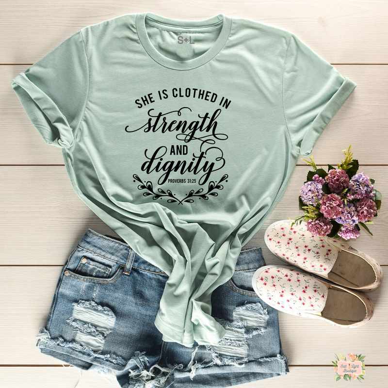 SHE IS CLOTHED IN STRENGTH & DIGNITY SHORT SLEEVE WOMEN'S T-SHIRT | UNISEX CUT - Salt and Light Boutique